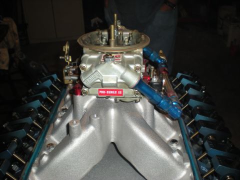 1985 Ford Bronco - Close-up of a Holley Pro-Series XC carburetor mounted on an engine.