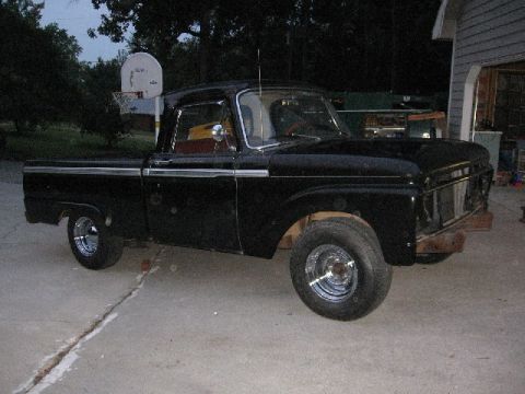 1966 Ford F-100 - Yeah, its a half ass spray job in the front yard, but at least they're not gray any more.