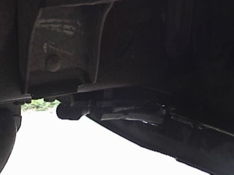 1991 Ford Bronco - Pic #2 of the hooks. It's not a very good pic, but you can see how the welded-on nutplate is against the frame. The bolts came from the fra…