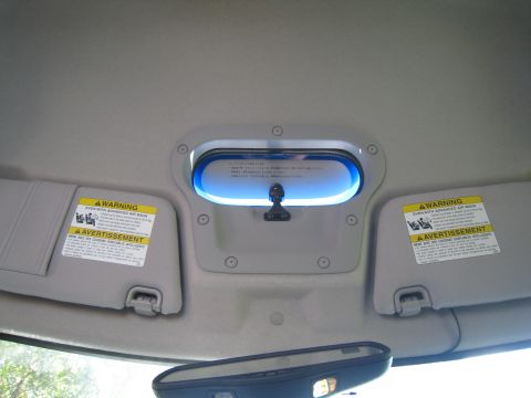 2007 Subaru Impreza - Overhead interior view showing the console light and sun visors with warning labels.