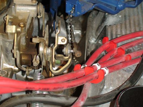 1979 Ford Bronco - Engine components, including spark plug wires and carburetor linkage, are visible in this close-up view.