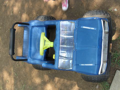 1994 Ford Bronco - This blue toy truck has "460 POWERED" written on its side.