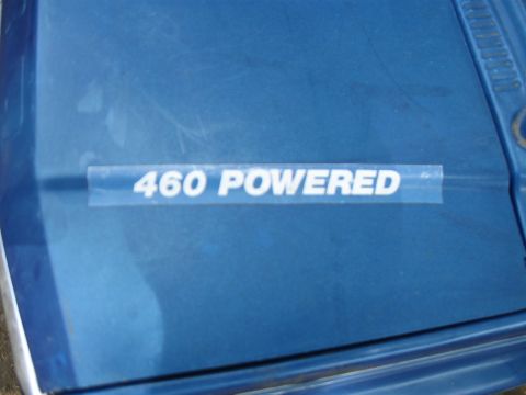 1994 Ford Bronco - Sticker on a blue vehicle indicates it is powered by a 460 engine.