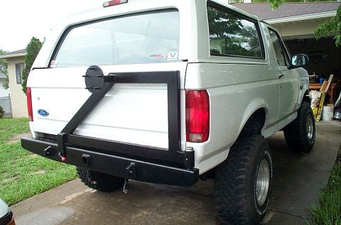 1992 Ford Bronco - Rear view of a 1992 Ford Bronco showing a custom bumper and spare tire carrier installation.