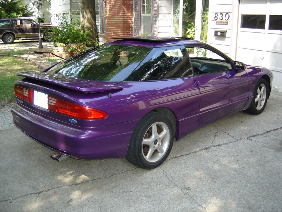 Purple 1994 Ford Probe, 3/4 front view, with a rear spoiler and sunroof