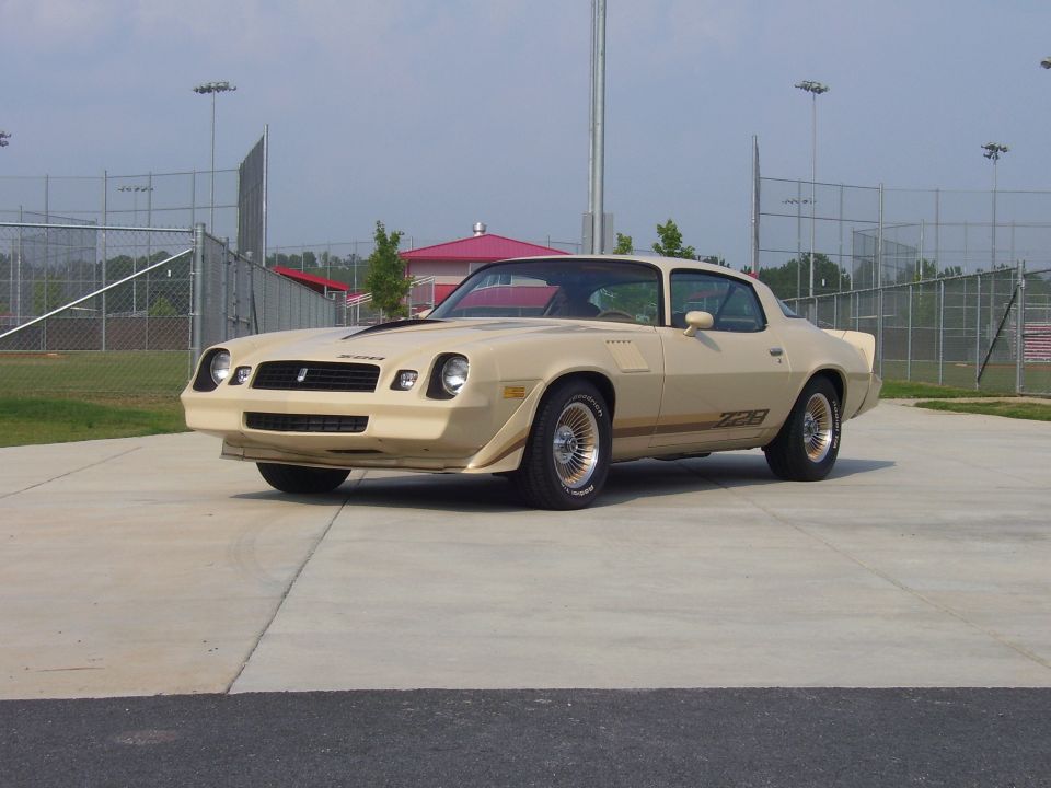 Tan 1979 Chevrolet Camaro Z28 with gold striping and wheels