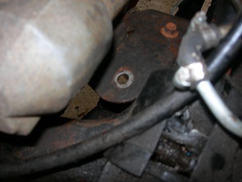 1984 Ford Bronco - Here is a better pic of the engine mount plate bolt hole that has a place to go in the 250-350s. Not so much on the 150-Bronco subframe.