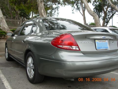 1995 Ford Taurus - Rear view of a gray Ford Taurus SEL sedan with a Nevada license plate.