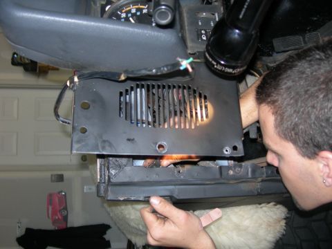 1991 Jeep Wrangler - Working on the dashboard of a 1991 Jeep Wrangler, focusing on the vent area and gauges.
