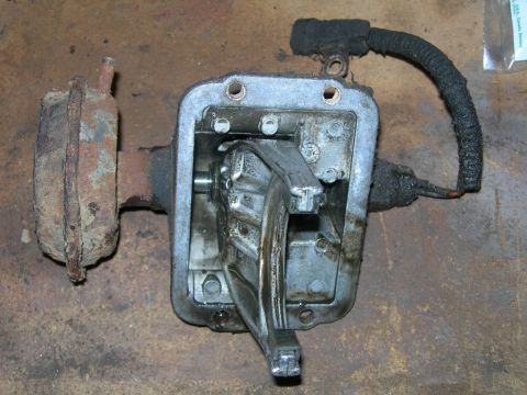 1991 Jeep Wrangler - This is a close-up view of a transfer case shifter mechanism, showing its internal components and linkage.