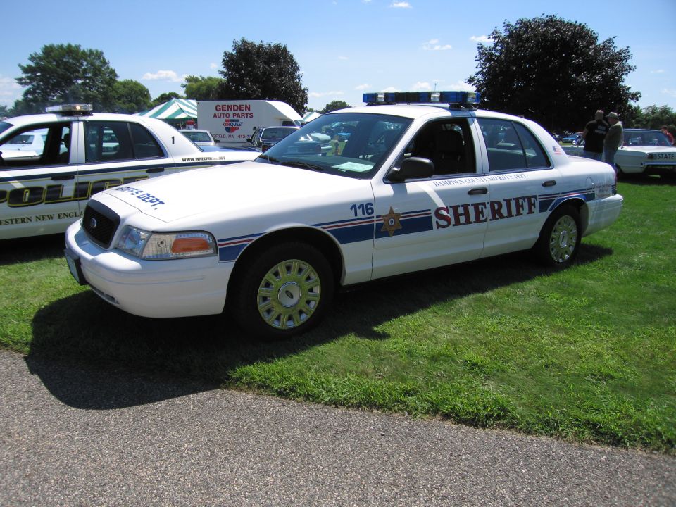 White Ford Crown Victoria SHERIFF cruiser unit 116 with push bar