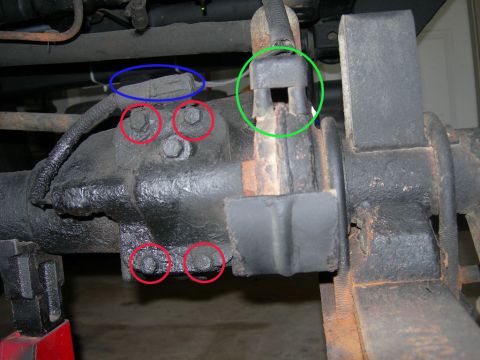 1991 Jeep Wrangler - This photo shows a close-up view of a vehicle's differential housing and suspension components, with several parts circled for emphasis.