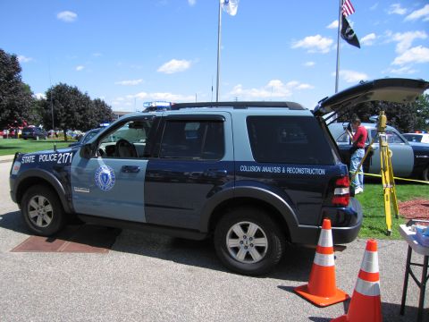 1991 Ford LTD Crown Victoria - Side view of a Massachusetts State Police Ford Explorer, unit 2171, lettered 'Collision Analysis & Reconstruction' with traffic cones nearb…