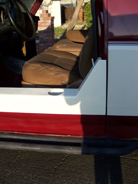 1991 Ford Bronco - Interior view of a 1991 Ford Bronco, focusing on the seats and door.