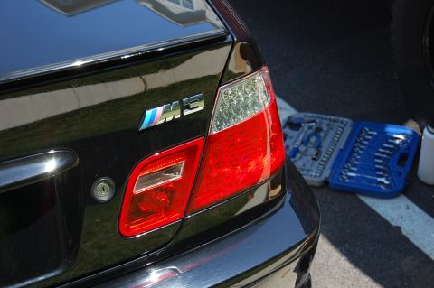 2002 BMW M3 - Rear view of a black BMW M3, its distinctive LED tail lights and M3 badging.