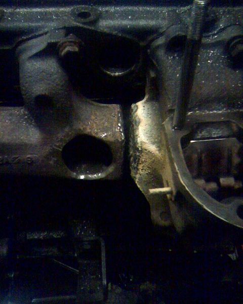 1953 Ford Mainline - Engine block and exhaust manifold detail, likely from an older vehicle.