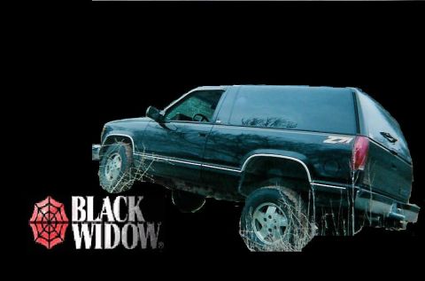 1982 Ford Bronco - A black SUV, possibly a Chevrolet Tahoe or GMC Yukon, is shown with a "Black Widow" logo and a "Z71" badge.