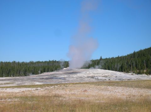 1996 Ford Bronco - Steam billows from Old Faithful geyser in Yellowstone National Park.