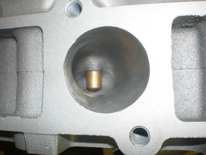 Close-up photo of a cast intake port on an aluminum cylinder head