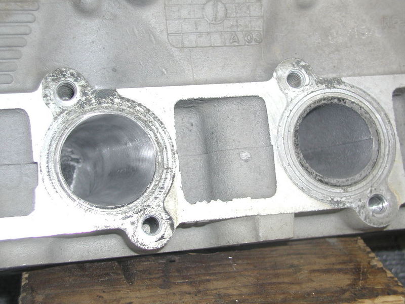 Close-up photo of cylinder head intake ports with casting marks