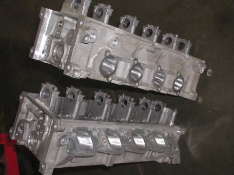 2007 Ford Mustang - Two engine cylinder heads are shown, likely for a V-engine configuration.