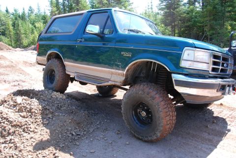 1996 Ford Bronco - This 1996 Ford Bronco is equipped with a lifted suspension and large off-road tires, ready for terrain.