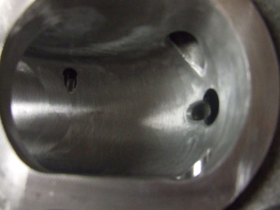Inside of a metal cylinder with two visible holes