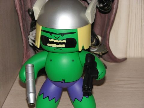 1991 Ford Bronco - A toy figure resembling the Hulk, complete with a helmet and weapons, is displayed.