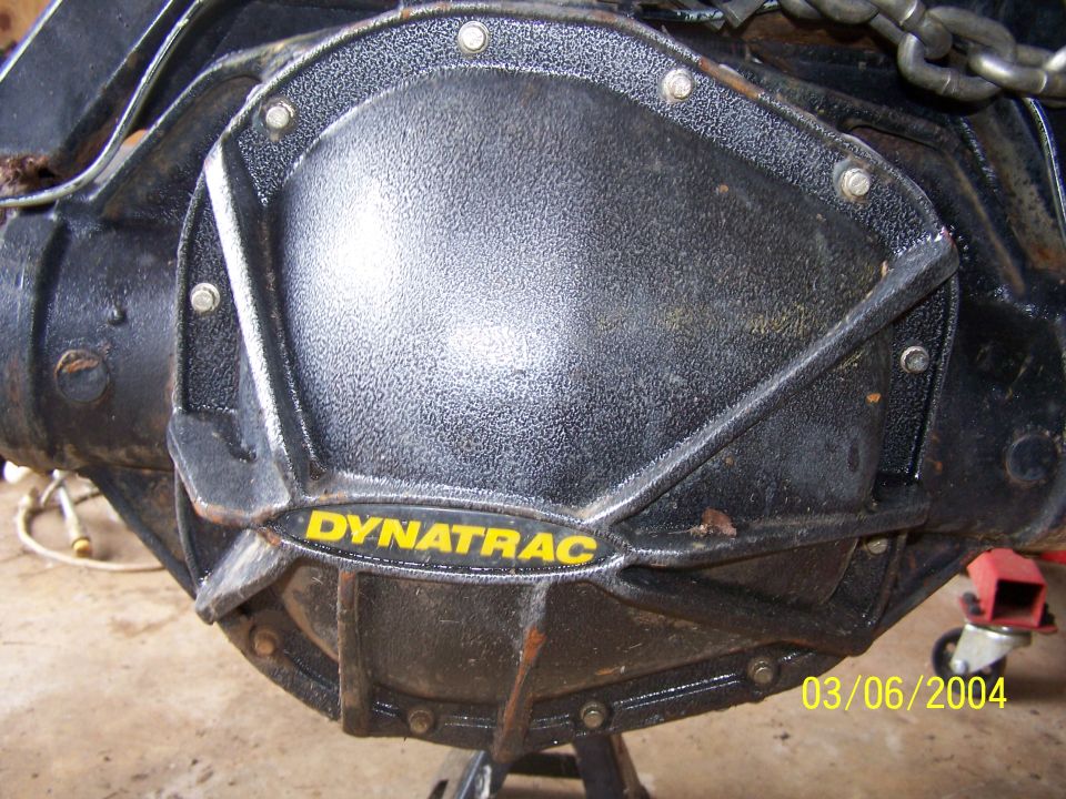 Close-up of a Dynatrac differential cover on a vehicle's rear axle