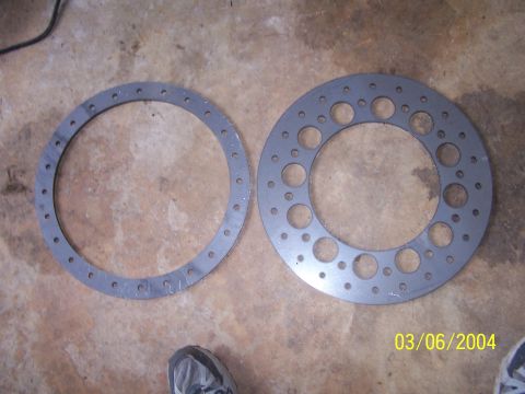1979 Ford F-150 - Two circular metal parts with hole patterns are shown on a floor, with a date stamp visible.
