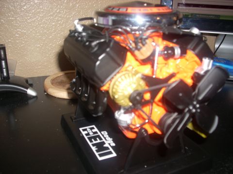 1992 Ford Bronco - A detailed model of a Dodge HEMI engine sits on a display stand.