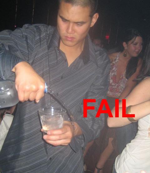 1988 Mercury Grand Marquis - A man is pouring liquid into a glass. A red text overlay says "FAIL".