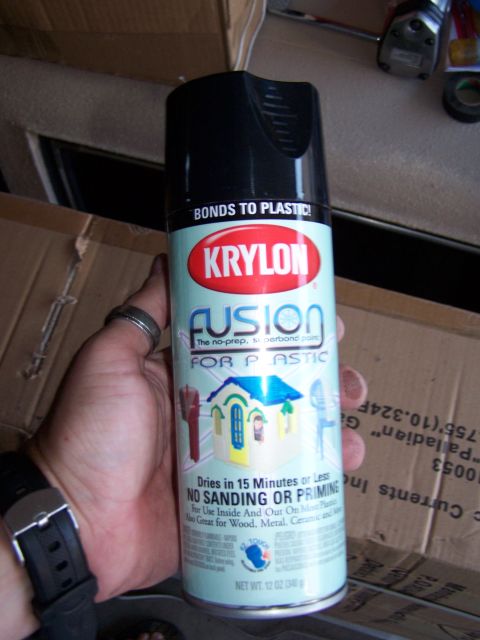 1986 Ford Bronco - Hand holding a can of Krylon Fusion spray paint, designed for plastic surfaces.