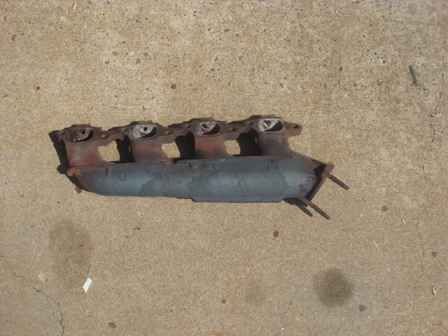 here is the pass side manifold out. I was lucky as a few of the bolts were loose like the drivers side.