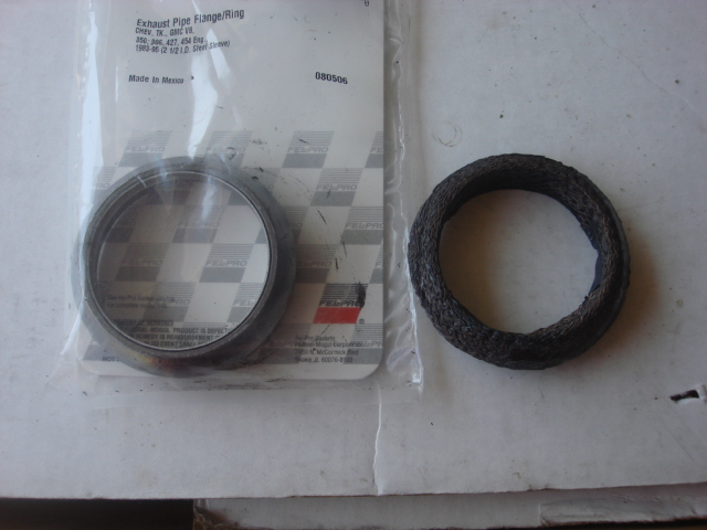 this is the drivers side doughnut. it was in poor shape. the new one is next to it.