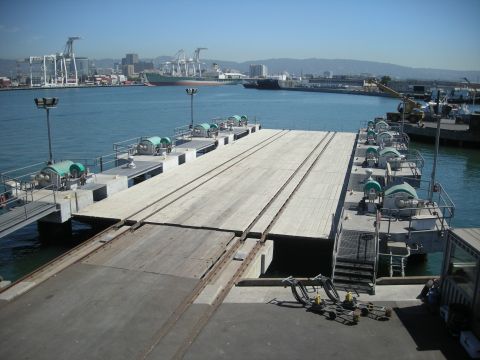 1991 Ford Bronco - A view of a ferry ramp and the port in the background on a clear day.