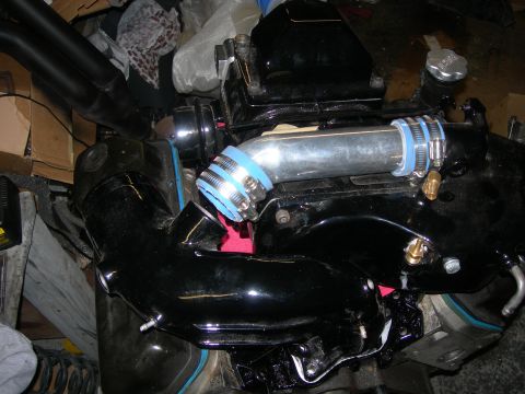 1984 Ford Bronco - Its a bit short after raising the manifold. I think I can use a longer hose to make it fit.