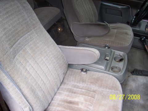 1988 Ford Bronco - Interior view of a vehicle's front seats and center console, with a date stamp visible.