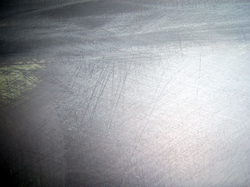 sanding scratches that the 2k has not filled
