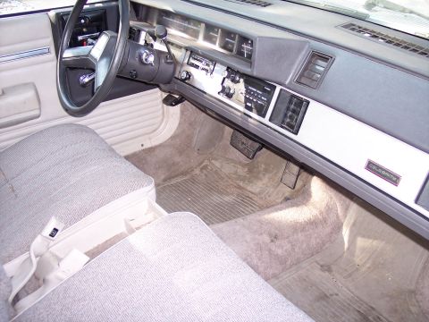 1972 Ford Ranchero - The interior of a car shows the dashboard, steering wheel, and seats.