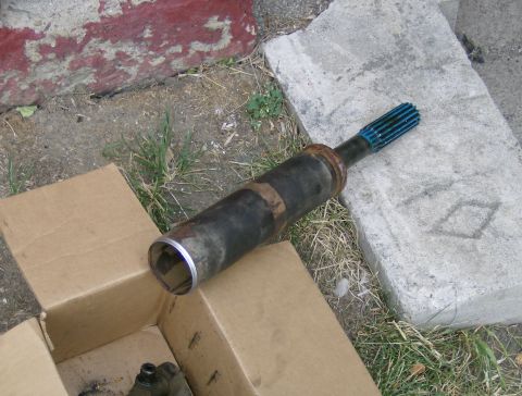 1990 Ford Bronco - What's left of the stock drive shaft. (90 bronco with an E4OD - 23 inches fully compressed)