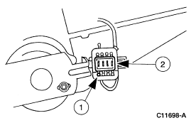 2007 Ford Mustang - Service procedure figure identifying an electrical connector and its locking tab with numbered callouts.