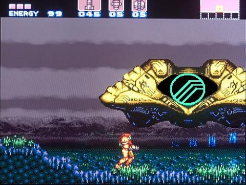 1988 Mercury Grand Marquis - A character navigates a digital landscape with a large, golden alien ship overhead. The game displays ENERGY 99.
