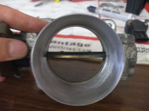 2003 Ford Crown Victoria - butterfly open wide showing half shaft and flat head allen screws.