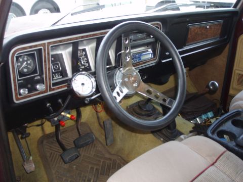 1979 Ford Bronco - Interior view of a 1979 Ford Bronco, the dashboard and driver's controls.
