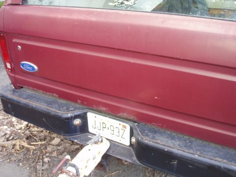 1979 Ford Bronco - 1979 Ford Bronco rear view with license plate JJP-93Z and trailer hitch.