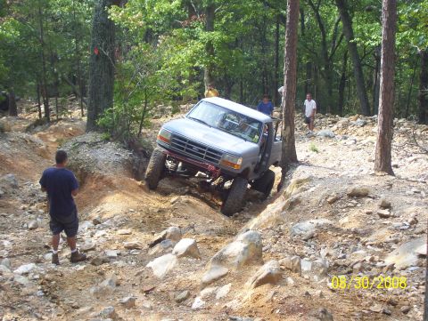1978 Ford Bronco - This truck navigates a challenging off-road course with steep inclines and loose rocks.