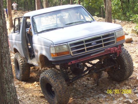 1978 Ford Bronco - This modified SUV navigates a challenging off-road course.