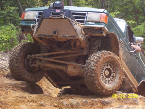 1978 Ford Bronco - This off-road vehicle, likely from the early 1980s, navigates a challenging rocky trail.