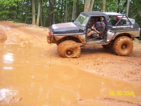 1978 Ford Bronco - A 1978 Ford Bronco navigates a muddy off-road trail on August 30, 2008.